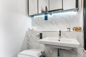 Hair dryer, towels, soap, shampoo