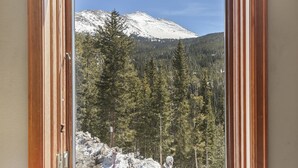 A mountain view through a window with wooden frames. - Views! Private 4 Bedroom Home with Private Hot Tub!!! (Breckenridge)