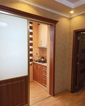 Fridge, microwave, electric kettle, cookware/dishes/utensils