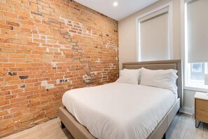 2 dormitorios, tabla de planchar con plancha, cuna de viaje y wifi