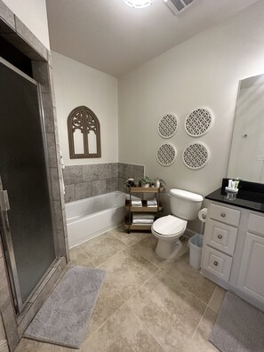 Jetted bath, hair dryer, towels, soap