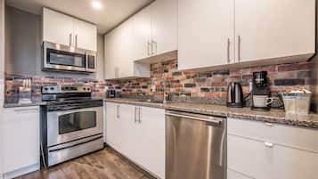 Apartment | Private kitchen | Full-sized fridge, microwave, oven, dishwasher