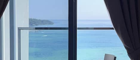 Family Room, Sea View | 1 bedroom, individually decorated, individually furnished, desk