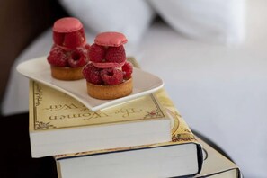 A dessert on a book with a white plate.