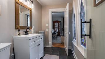 Bathtub, hair dryer, towels