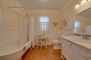 Bathtub, hair dryer, towels