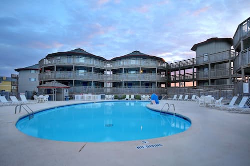 Indoor pool, 2 outdoor pools, open 9:00 AM to 11:00 PM, pool umbrellas