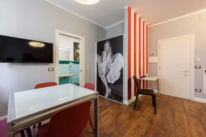 Comfort Apartment | Living area | 40-inch flat-screen TV with digital channels, TV