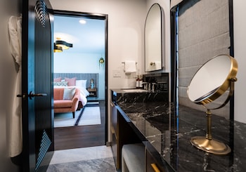 The Conservatory | Bathroom | Free toiletries, hair dryer, bathrobes, slippers at Orli La Jolla