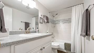 Hair dryer, towels, soap, shampoo