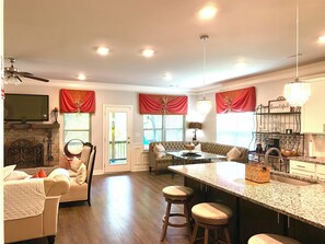 Smart-TV, Kamin, Videospiele, Bücher