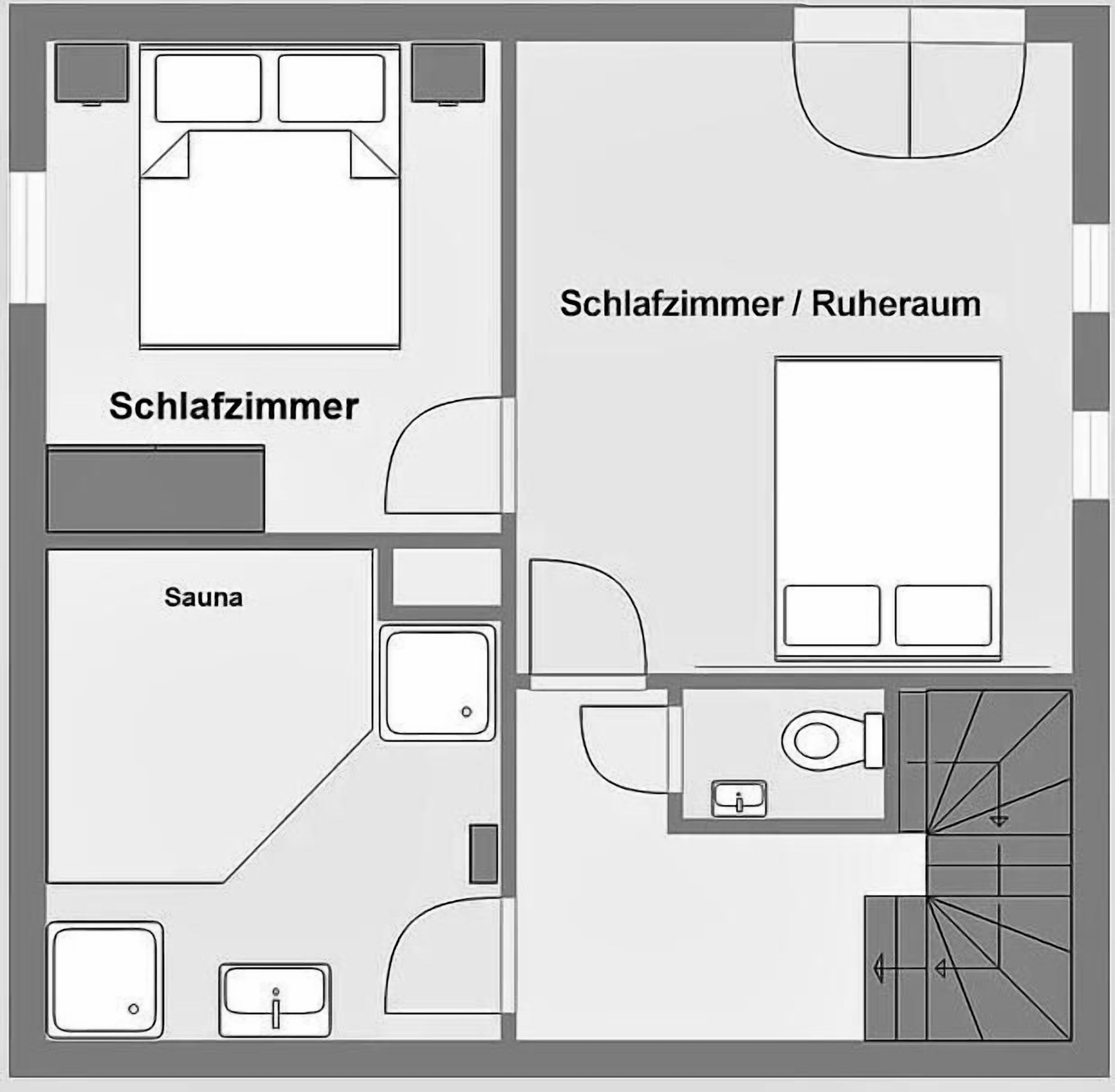 Een plattegrond van een hotelkamer met een eigen badkamer, een douche, een sauna en een zithoek.