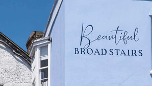 A building with a sign that reads 'Beautiful Broad Stairs.' - Beach Mews | Central | Family house | Parking (Broadstairs)
