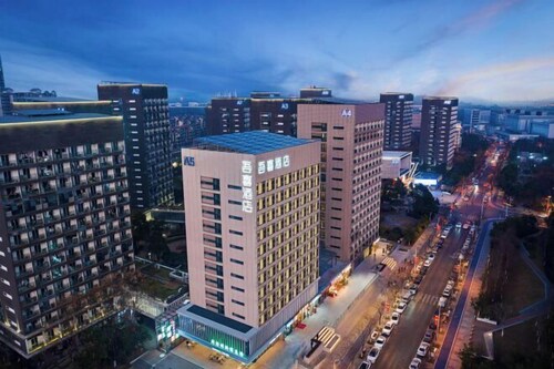 Wuxiji Boutique Hotel (Wuhan Future Science & Technology City Huawei Institute Branch)