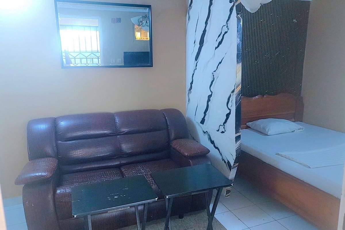 Signature Studio, 1 Queen Bed | Living area | 32-inch LED TV with satellite channels, TV