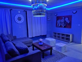 Signature Penthouse | Living area | 32-inch LED TV with satellite channels, TV