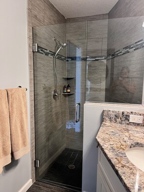 Shower, towels, soap, shampoo