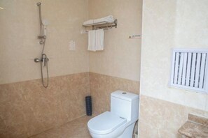 A bathroom with a shower, toilet, and towel rack. - Junyi · Leishen Jingjie E-Sports Hotel (Beijing Yanqing Global Xinyi Department Store) (Beijing)
