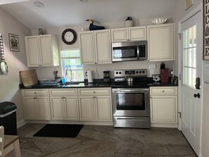 Fridge, microwave, oven, stovetop - Cozy Country Cottage #2 (Miller Place)