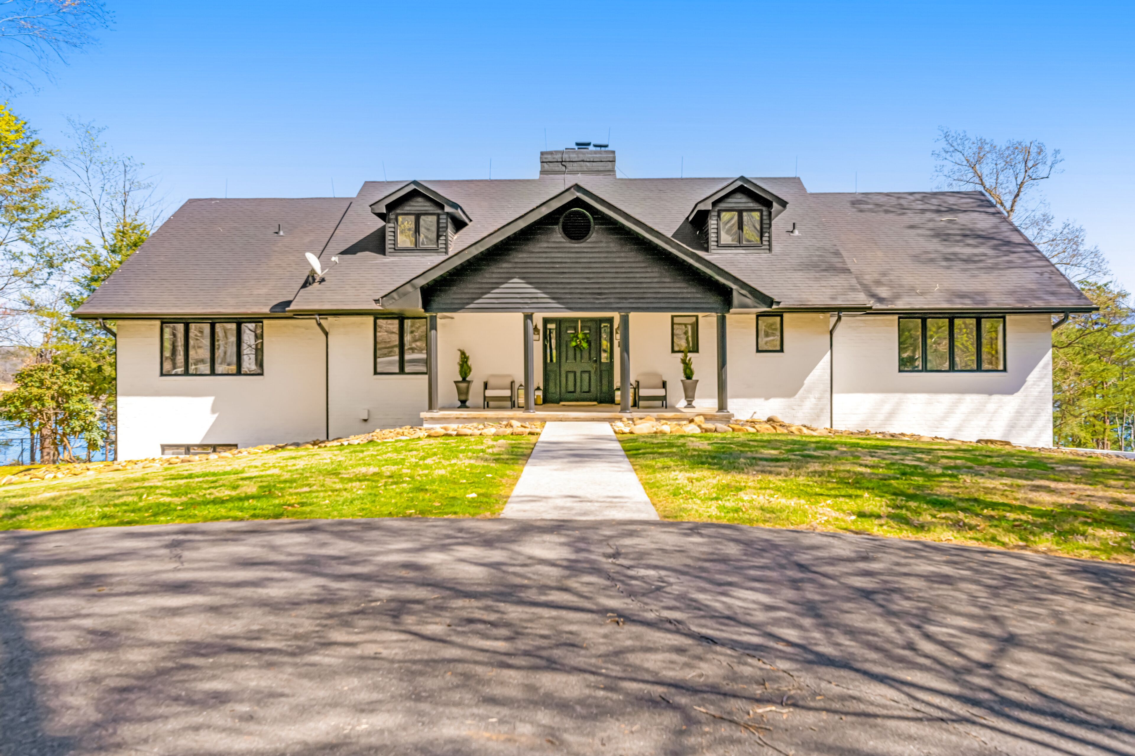 Spacious lakefront escape with hot tub, firepit, outdoor areas, & amazing views