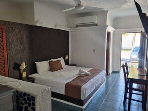 Junior Studio Suite | 1 bedroom, in-room safe, individually furnished, bed sheets