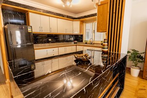 Comfort Apartment | Private kitchen | Full-size fridge, microwave, oven, dishwasher