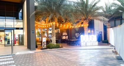 Exquisite 4BR Townhouse at DAMAC Hills 2 Victoria by Deluxe Holiday Homes