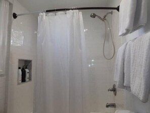 Hair dryer, towels, soap, shampoo