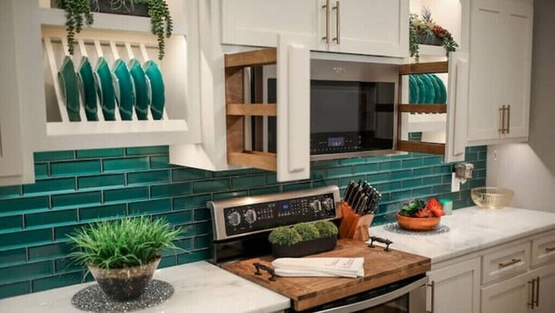 A kitchen with white cabinets, a teal backsplash, and a wooden countertop. - Barndominium with Access to Horse Farm and Fishing (Comer)