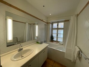 Apartment | Bathroom | Combined shower/tub, deep soaking tub, hair dryer, towels