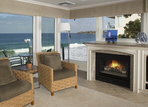 Deluxe Villa, Multiple Beds, Balcony, Ocean View | Living area | TV, fireplace