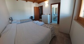 2 quartos, acesso à internet, roupa de cama