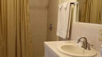 Standard Room, 1 King Bed | Bathroom | Shower, towels, soap, toilet paper