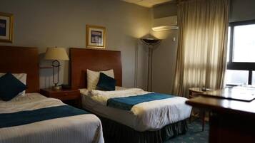 Desk, laptop workspace, free WiFi, bed sheets