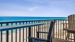 A balcony with a view of the beach and ocean. - Breathtaking views! 1 BR Gulf front condo w/2 pools on relaxing east side of PCB (Panama City Beach)