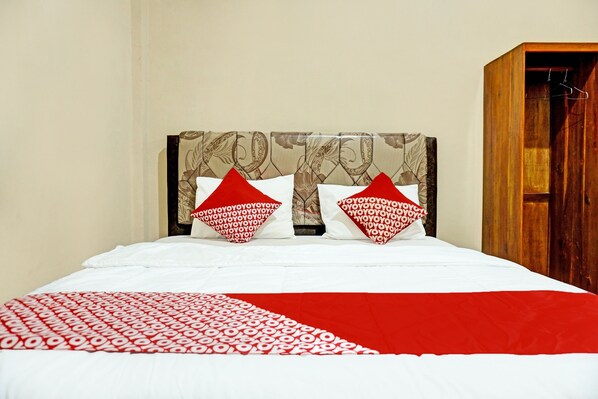 Desk, laptop workspace, bed sheets