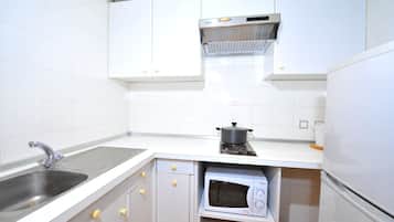 Superior Condo | Private kitchen | Fridge, microwave