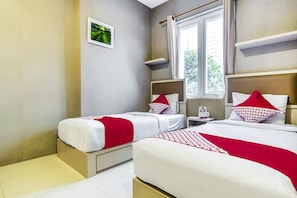 Laptop workspace, free WiFi, bed sheets