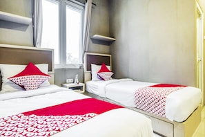 Laptop workspace, free WiFi, bed sheets