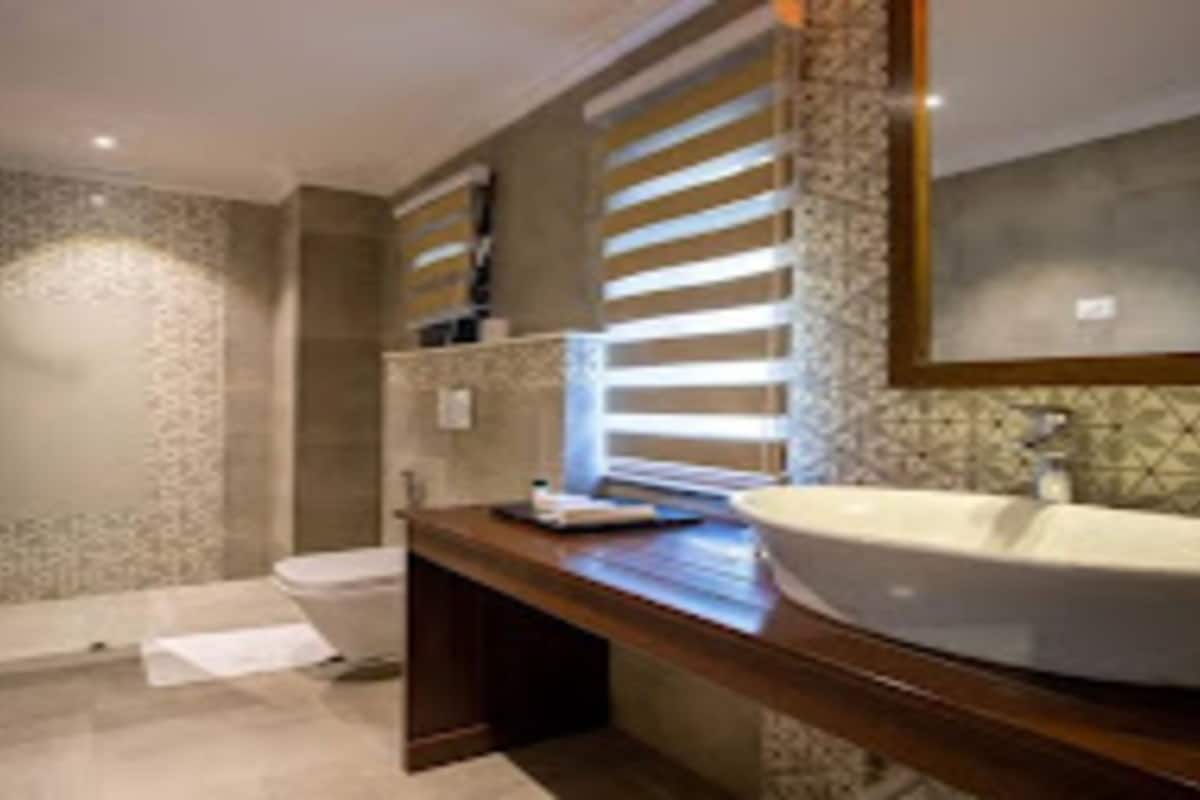 shower, rainfall showerhead, towels, soap