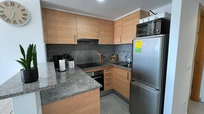 Fridge, microwave, dishwasher, coffee/tea maker