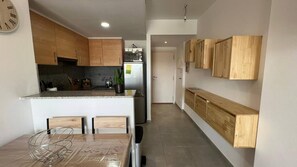 Fridge, microwave, dishwasher, coffee/tea maker
