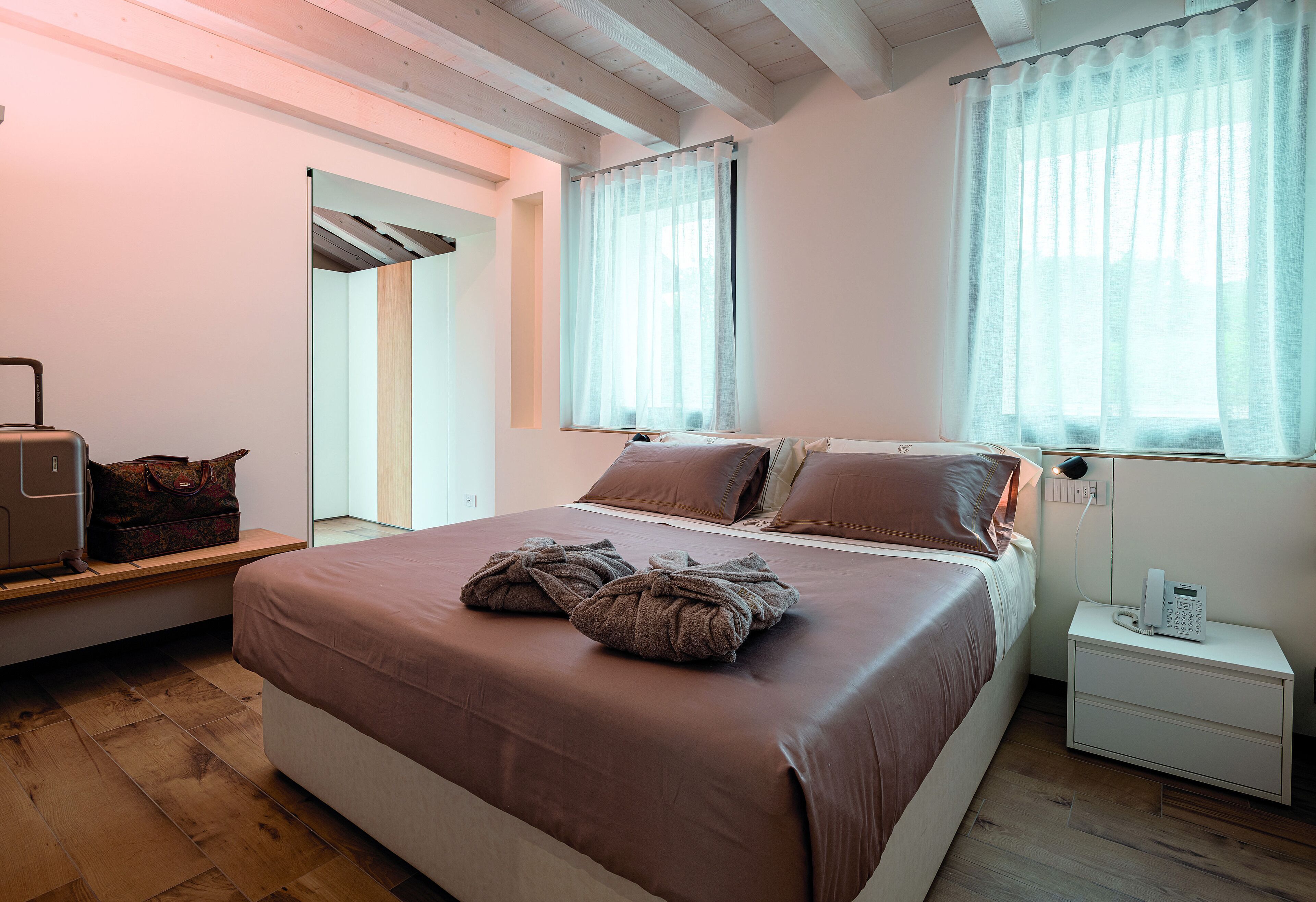 Premium bedding, down duvets, minibar, in-room safe