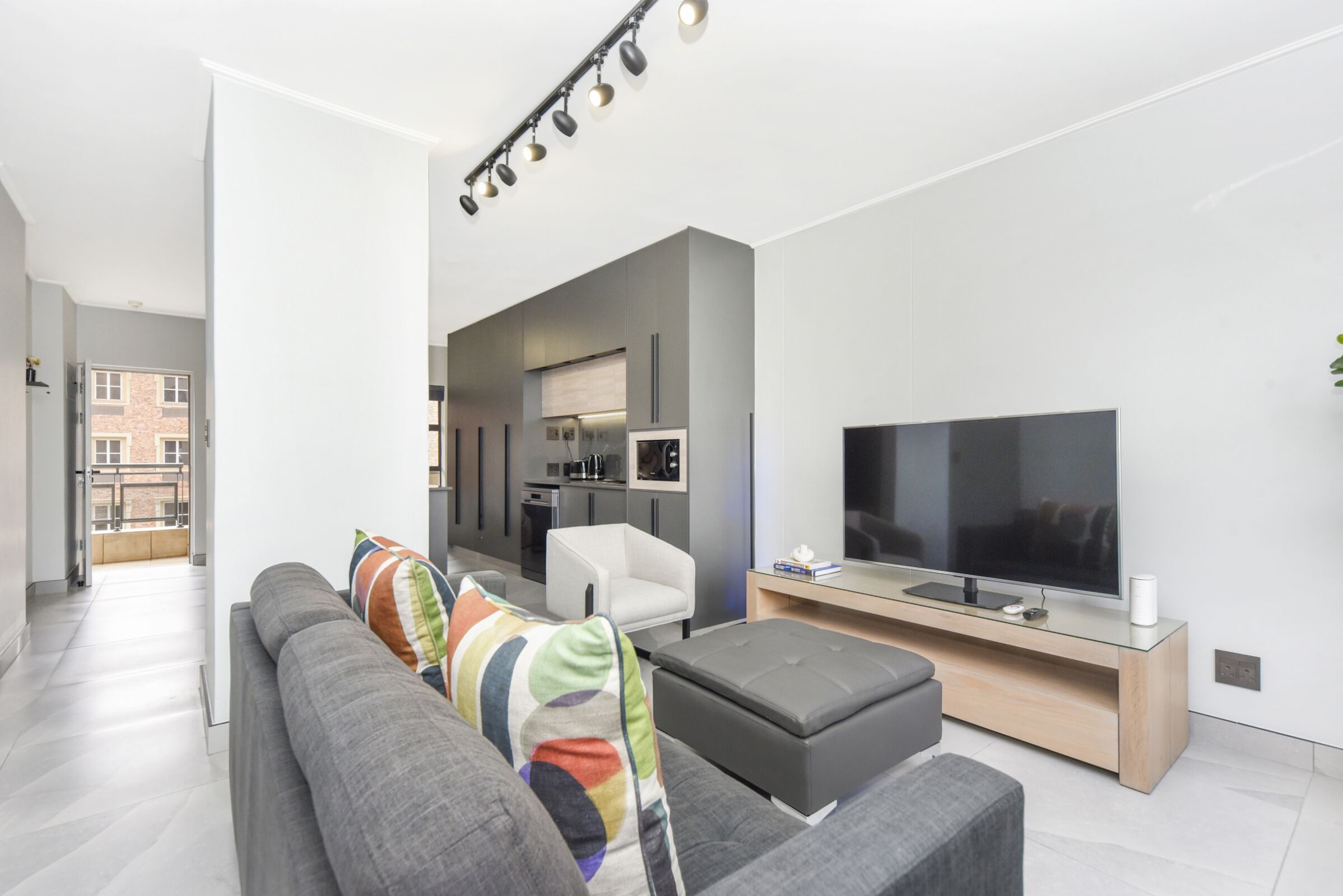 City Apartment | Living area | 50-inch flat-screen TV with cable channels, TV, Netflix