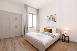 1 slaapkamer, een strijkplank/strijkijzer, wifi, beddengoed