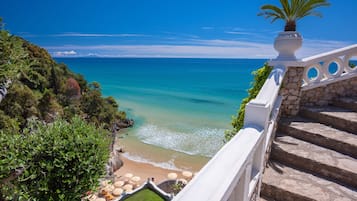 Private beach, white sand, sun-loungers, beach umbrellas