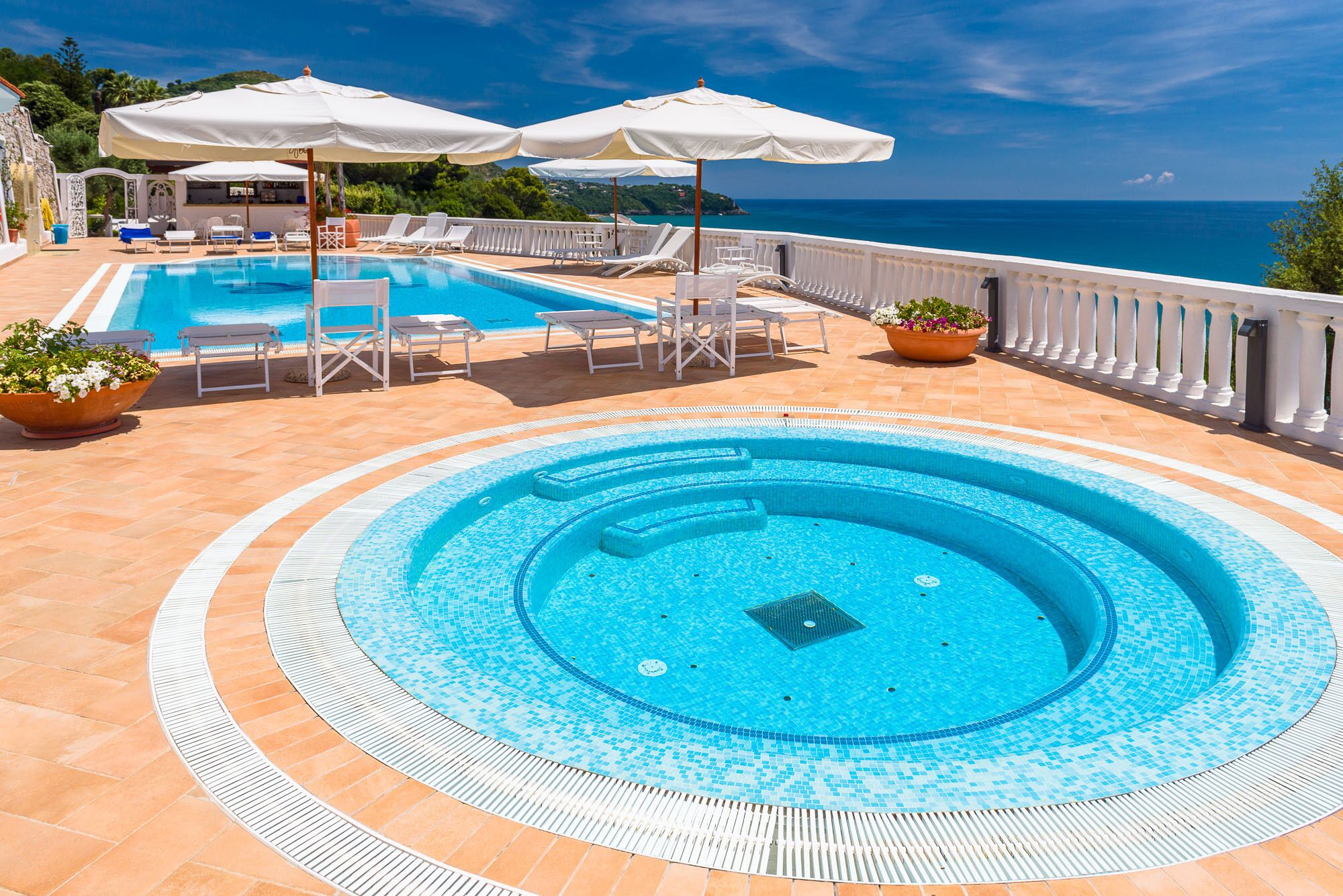 Seasonal outdoor pool, pool umbrellas, pool loungers