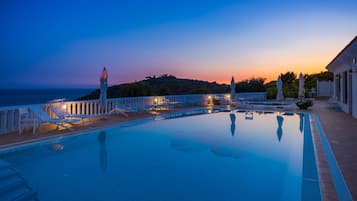 Seasonal outdoor pool, pool umbrellas, sun loungers