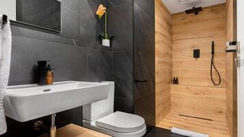 Design Apartment | Bathroom | Shower, hair dryer, towels