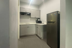 Deluxe Suite, 2 Double Beds, Non Smoking | 1 bedroom, individually decorated, individually furnished, desk